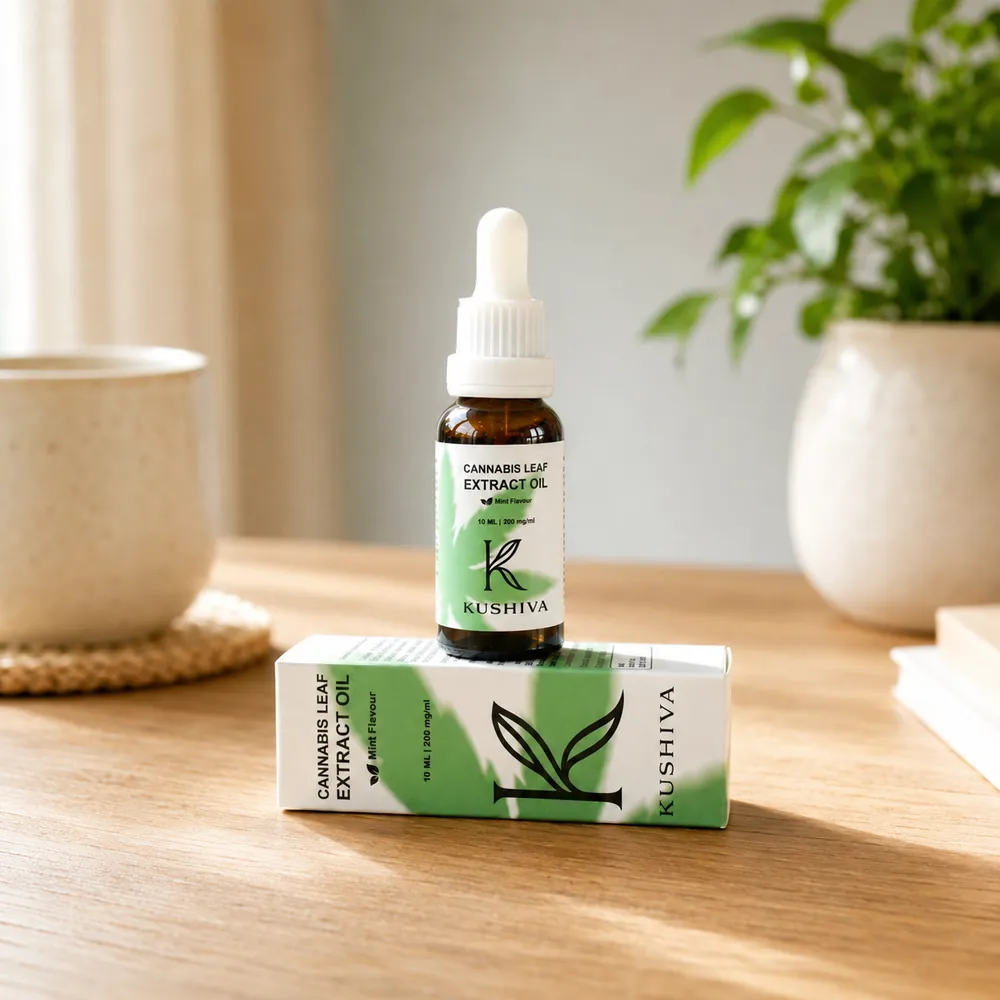 Kushiva Cannabis Leaf Extract Oil 10 ml bottle standing on its mint-flavour carton, which carries the 10 ml and 200 mg per ml declaration