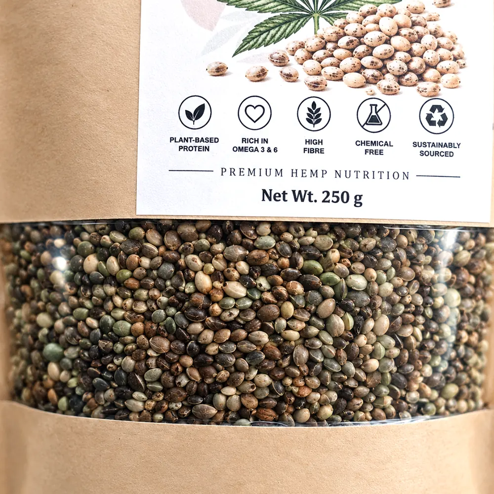 Kushiva hemp seeds pouch label close up showing the plant-based protein, omega 3 and 6, high fibre and sustainably sourced marks above the clear window